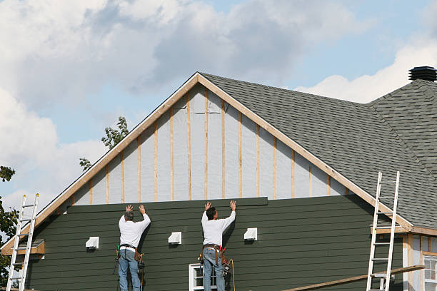 Professional Siding technician working in Hadley, PA